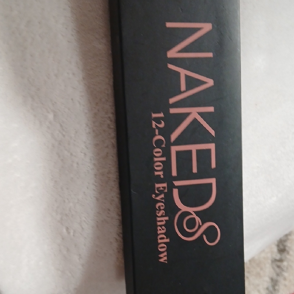 NAK 12-Color Eyeshadow Palette — Black Case with Rose Lettering